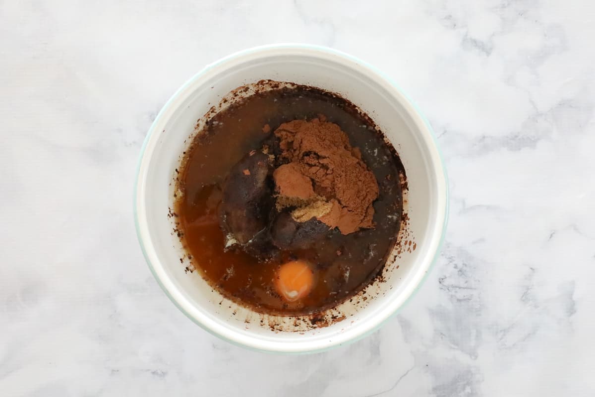 Wet and dry ingredients all together in a bowl.