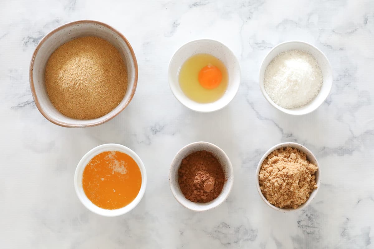 The Ingredients in 6 small bowls on a bench